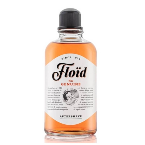 Butelka 400 ml aftershave Floïd z zakrętką na białym tle. Płyn jasno-pomarańczowy, etykieta z napisem Floïd The Genuine, ilustracją mężczyzny i tekstem AFTERSHAVE na dole.
