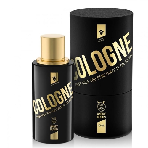 Woda kolońska Jack Saloon w czarnej, matowej butelce 100 ml z złotą nakrętką i napisem COLOGNE oraz logo Angry Beards, obok cylindrycznego opakowania o tym samym wzornictwie na neutralnym tle.