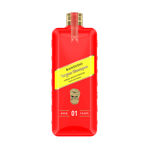 Czerwony szampon 350 ml w prostokątnym flakonie z złotym logo czaszki, żółta etykieta z napisem BANDIDO Argon Shampoo i informacjami o składnikach, stoi pionowo na białym tle.