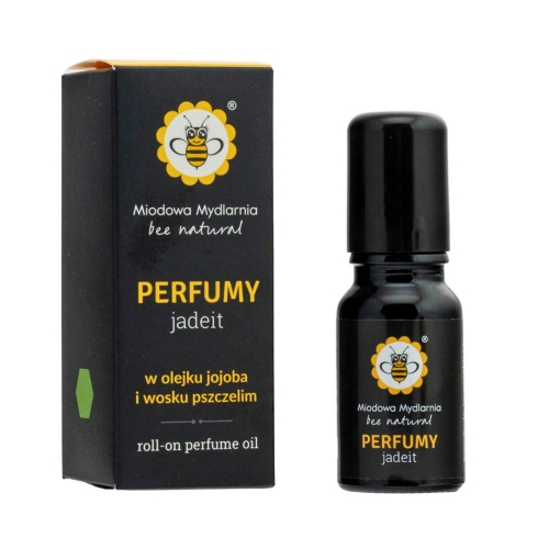 Perfumy roll-on Miodowa Mydlarnia jadeit 10 ml w czarnej, matowej butelce z kulką aplikacyjną, obok kartonowego opakowania w czerni i żółci z napisem 'PERFUMY', 'jadeit' i logo marki.