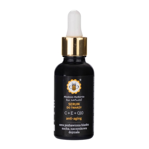 Serum do twarzy 30 ml w czarnej, matowej butelce z pipetą, złotą nakładką i logo Miodowej Mydlarni. Etykieta z napisem „C + E + Q10” i informacją o działaniach anti-aging. Produkt stoi pionowo na jednolitym tle.