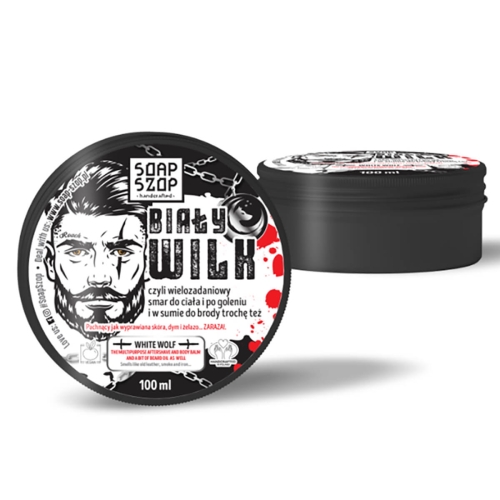 Balsam do brody Soap Szop Biały Wilk 100 ml w czarnej, matowej puszce z etykietą przedstawiającą mężczyznę z brodą i łańcuch, w kolorach czerni, bieli i czerwieni, z napisem Biały Wilk, puszka nieotwarta na białym tle.