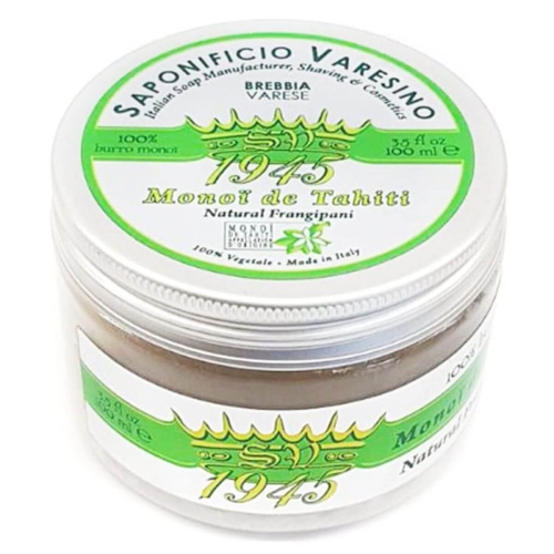 Krem przed goleniem Saponificio Varesino 100 ml w zielono-białym słoiku z białą zakrętką. Etykieta z napisem Monoi de Tahiti, 100% burro monoi i Natural Frangipani, na jednolitym tle, frontalny widok.