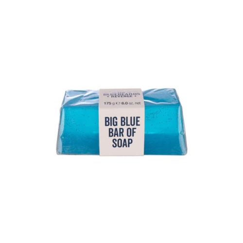 Błękitne mydło w kostce o wadze 175 g, z widoczną etykietą BIG BLUE BAR OF SOAP. Produkt leży na jednej z krawędzi, z błyszczącą, przezroczystą powierzchnią, w prostokątnym kształcie. Tło białe, co podkreśla intensywny kolor mydła.