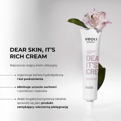 Naprawczo-kojący krem w białej tubce z różowym napisem DEAR IT'S CREAM na jasnym tle, obok kwiat i liść. Produkt regeneruje barierę hydrolipidową i łagodzi podrażnienia.