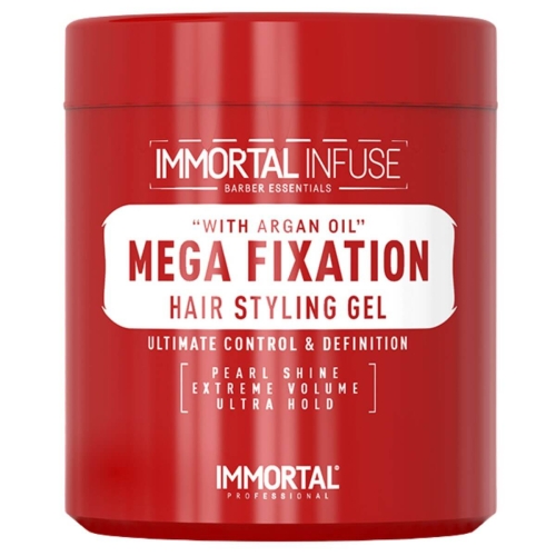Czerwony pojemnik żelu do włosów 500 ml z białymi napisami: MEGA FIXATION, WITH ARGAN OIL, PEARL SHINE, EXTREME VOLUME, ULTRA HOLD. Logo IMMORTAL u dołu. Pojemnik stoi pionowo na gładkim tle.
