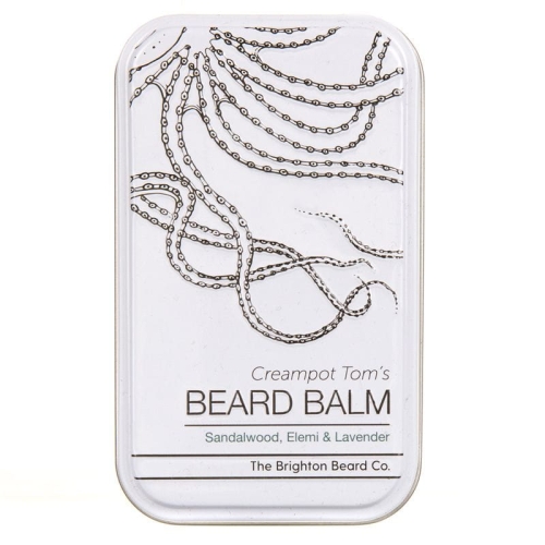 Biały, prostokątny pojemnik na balsam do zarostu z grafiką splątanych łańcuchów. Napisy: Creampot Tom’s BEARD BALM oraz składniki: Sandalwood, Elemi & Lavender. Metalowe wieczko, widok frontalny.