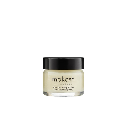 Krem do twarzy Mokosh w szklanym słoiczku z czarną nakrętką. Etykieta z napisem Krem do twarzy Malina i Facial cream Raspberry na jasnym tle. Produkt na białym tle, frontalnie.