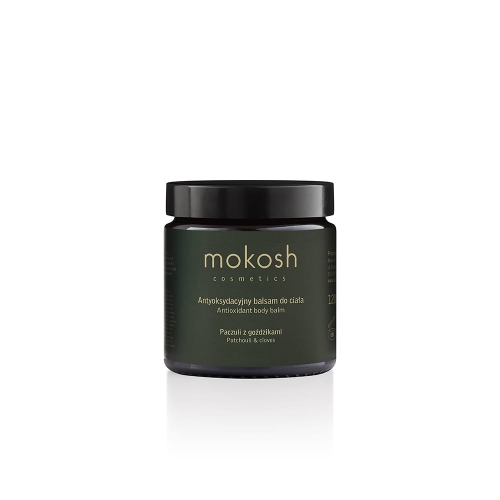 Antyoksydacyjny balsam do ciała w ciemnozielonym słoiku z czarną pokrywką, z napisem mokosh cosmetics oraz Antyoksydacyjny balsam do ciała po polsku i angielsku. Ciemna etykieta z składnikami: Paczuli i goździki.