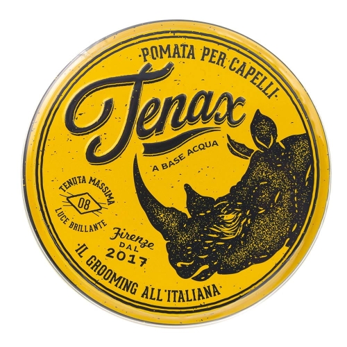 Żółte okrągłe opakowanie pomady do włosów Tenax z czarnym logo, rysunkiem nosorożca i napisami: Pomata per capelli, a base acqua, il grooming all'italiana. Widok frontalny pełnej powierzchni.