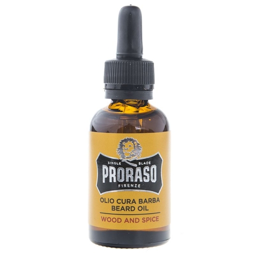 Butelka olejku do brody Proraso z brązowego szkła z aplikatorem. Złota etykieta z czarnym logo i napisem Olio Cura Barba Beard Oil oraz hasłem Wood and Spice na białym tle.